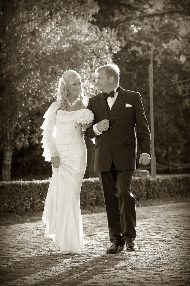 Bride and groom walking together at their wedding