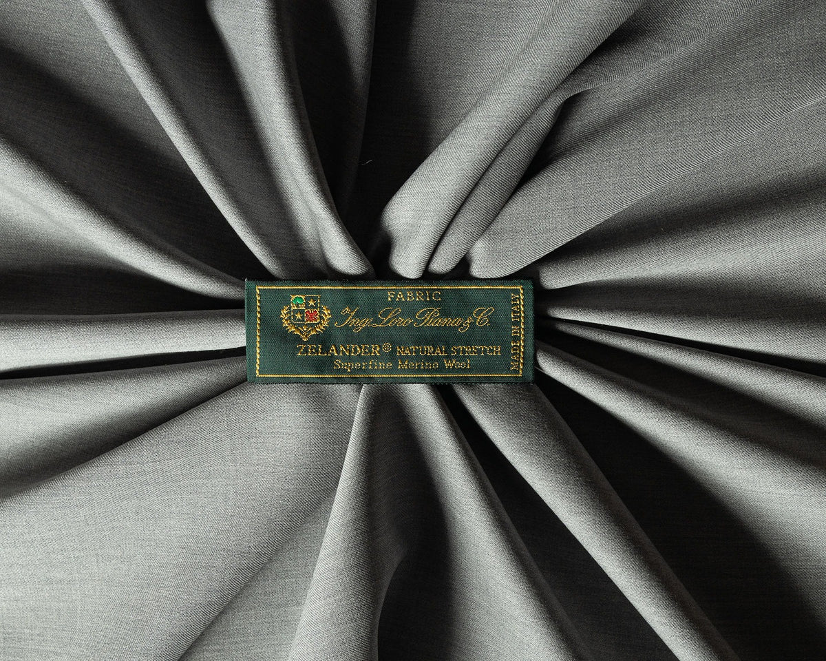 Loro Piana grey merino wool fabric with woven brand label